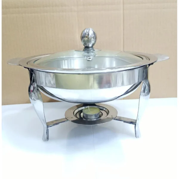 🫕 Stainless Steel Round Chafing Dish – Serve in Style Like 5-Star Buffets! Bring the luxury of hotel-style serving to your home daawat with this premium stainless steel round chafing dish. Whether you're hosting a party, BBQ, wedding event, or just serving biryani for the family — this elegant serving bowl makes your food presentation unforgettable. 🔥 Keeps Food Hot & Fresh for Hours This buffet dish is designed to retain heat, so your meals stay warm for longer without losing their flavor or texture. Perfect for: Biryani Nihari / Paya Pasta & BBQ items Gravies & more The heat-friendly base makes it ideal for stove or chafing fuel stands. ✨ Premium Steel – Mirror Polish Finish Crafted from high-quality, food-grade stainless steel, this serving bowl is: ✅ Rust-resistant ✅ Long-lasting ✅ Hygienic and safe for all kinds of food ✅ Mirror finish that looks stylish on any dining table With its round design and domed lid, it looks exactly like those in banquets and wedding halls. 🎉 Perfect for Every Occasion Whether it’s a wedding, iftar party, mehndi, or family dinner, this dish brings a touch of class and convenience. Guests will love the elegant look, and you'll love how easy it is to serve and clean. 🧽 Easy to Handle & Clean Wide handles for easy grip Lid fits snugly to keep food hot Dishwasher safe Stackable design for easy storage